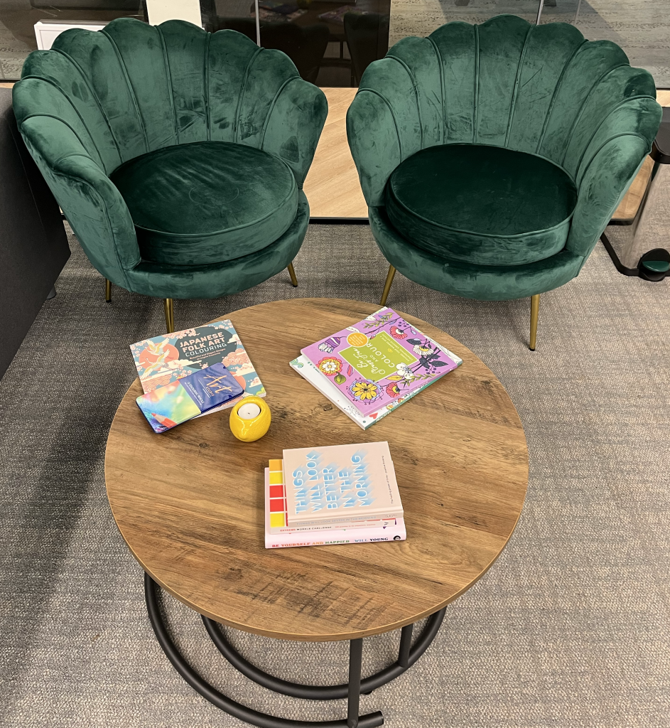 Colouring books and comfy chairs in the office